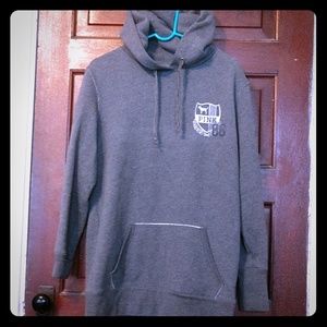 A Victoria Secret pink hoodie